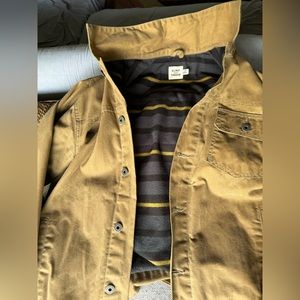 FLINT AND TINDER
Flannel-Lined Waxed Trucker Jacket
in Field Tan